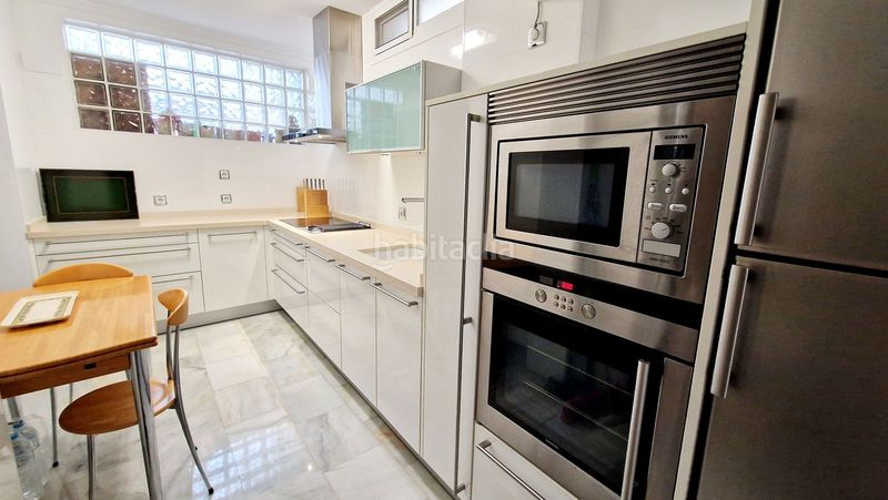Foto 19128e25-3aa1-44d6-9575-138ca43ead85. Casa adosada magnífico adosado reformado golf, con terraza y 2 plazas de parking en Mijas