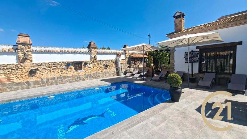 Foto 5235951a-11ff-464c-a594-b2eb849f9425. Chalet dans urbanización los arroyos 20 dans Arriate