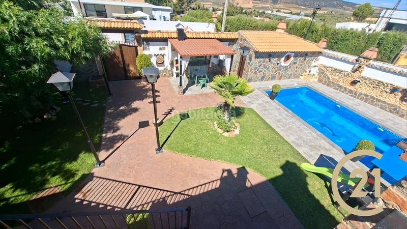 Foto 6833ff2c-befc-4d0a-bbb2-417e04b0cd31. Chalet dans urbanización los arroyos 20 dans Arriate