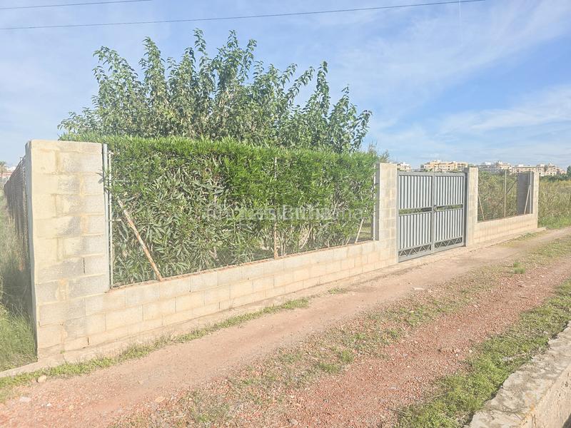 Foto f2446f28-0e03-4bc5-b6ec-5e435f30a9b5. Terreno residenziale in Llombai