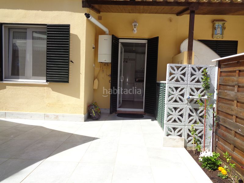 Foto a95952cc-9272-4ba9-a6f9-98b23fb9549d. Casa aparellada amb aparcament piscina a Islantilla golf Islantilla