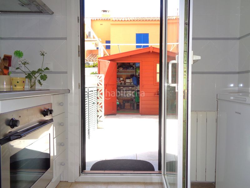 Foto cbb5a1da-17c3-4415-8ef8-c0a7f5f4e089. Casa aparellada amb aparcament piscina a Islantilla golf Islantilla