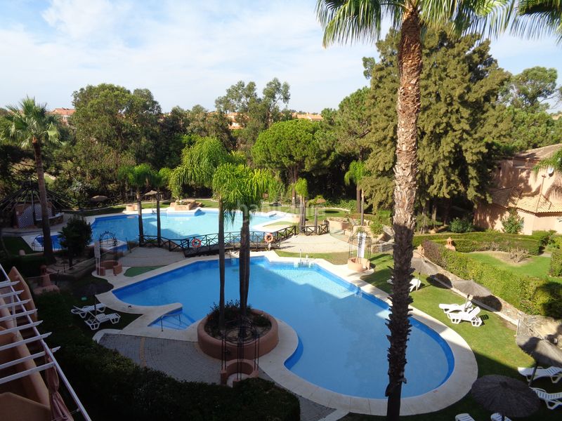 Foto c1f85377-e761-4d1a-8edb-fa721e74dc7e. Casa adossada amb aparcament piscina a Islantilla golf Islantilla