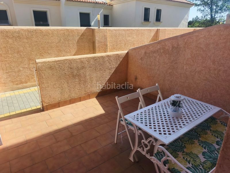 Foto 2475cca1-648e-45cf-921c-30191c29784f. Semi detached house with parking pool in Islantilla golf Islantilla