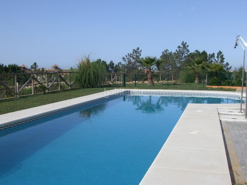 Foto 2cca7502-9d75-4e76-8bcd-4dcba81f50b3. Semi detached house with parking pool in Islantilla golf Islantilla