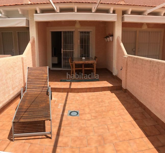 Foto 2f6d6c90-1298-4ccb-aa4b-8a58601930ee. Semi detached house with parking pool in Islantilla golf Islantilla