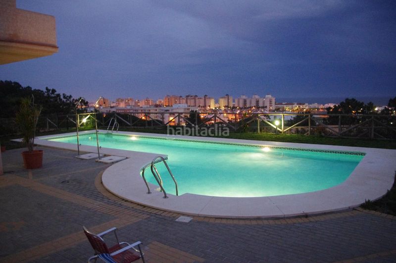 Foto 40844277-423b-44a9-a41b-bec39d7645af. Semi detached house with parking pool in Islantilla golf Islantilla
