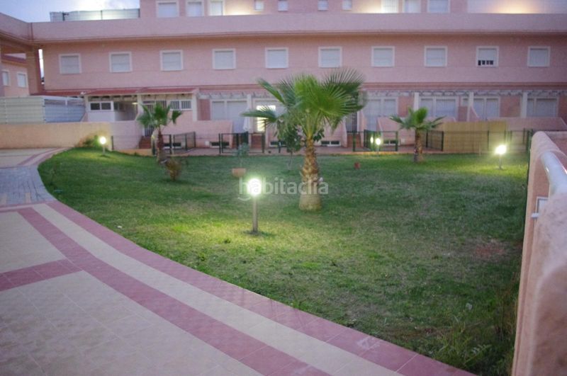 Foto 9f704c8f-7ec8-411e-8e49-872a7ded2b37. Semi detached house with parking pool in Islantilla golf Islantilla