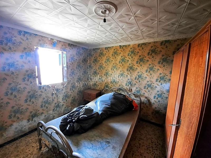 Foto 6b9be715-ca42-49dd-b025-8e6dea2f1c00. Masía cortijo para reformar en los alrededores . esta propiedad de 62m2 cuenta con 5 habitaciones, amplio comedor, cocina, gar en Taberno