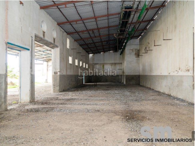 Foto 38c85d19-4cd3-4b11-907f-87fb5b68cb3c. Nau industrial a Marchena