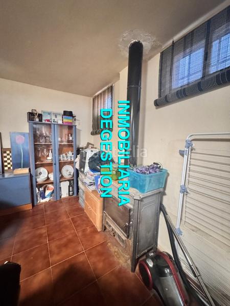 Foto 1597ee0a-0d23-4fd0-bc13-02119619c83e. Casa adossada amb xemeneia aparcament a San Gonzalo Linares