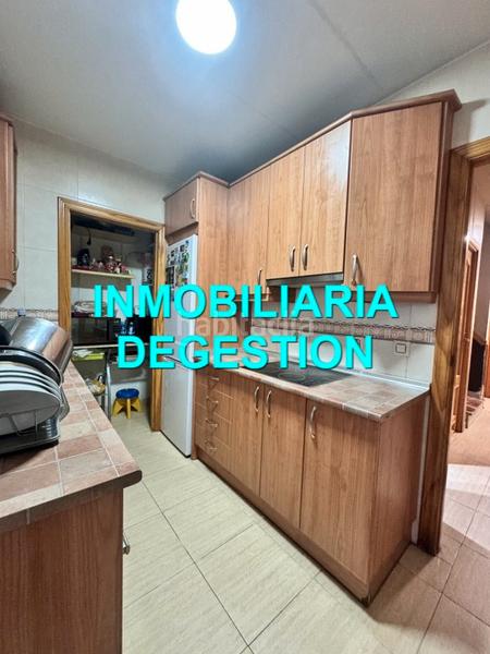 Foto 795825bd-367f-47e0-b0d8-6a517f0ffc60. Casa adossada amb xemeneia aparcament a San Gonzalo Linares