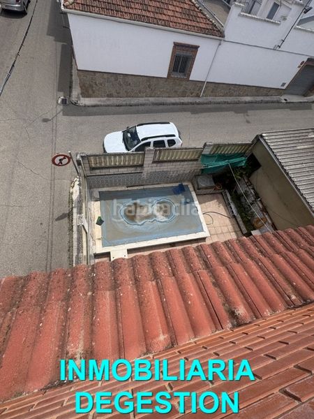 Foto 186809fb-3091-4ff0-8b69-823bfb637675. Casa adossada amb calefacció piscina a Zona Hospital Linares