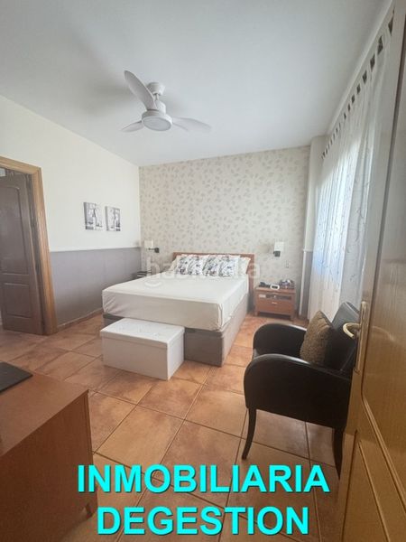 Foto fb3451d0-f7a3-497b-9301-e9c36b6d1b79. Casa aparellada amb calefacció aparcament piscina a Linares