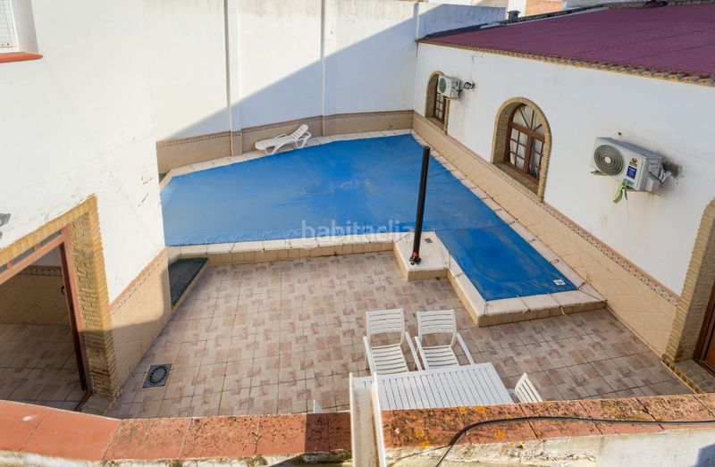 Foto 21ac13b9-d60b-49a6-b88c-aeb95d3665e2. Casa adossada amb calefacció aparcament piscina a Palma del Condado (La)