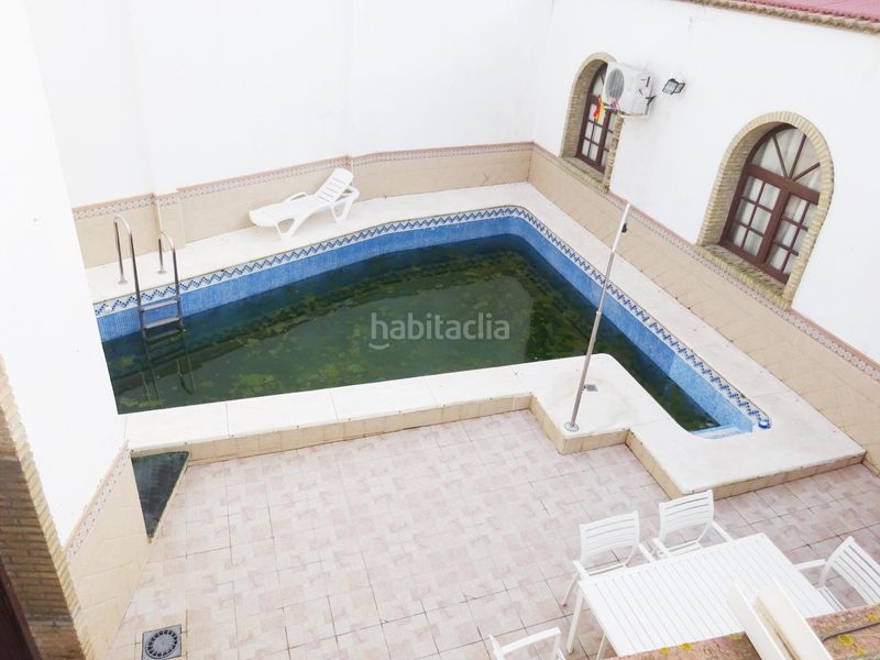 Foto b3dab659-d737-4dde-977a-a6723524ca3d. Casa adossada amb aparcament piscina a Palma del Condado (La)
