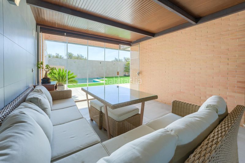 Foto ac3f71bc-d688-413e-b853-5fc76753b528. Casa aparellada amb aparcament piscina a Loreto Espartinas