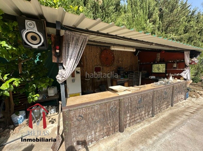 Foto 418745c5-bdd3-41a7-8d76-0494d008500c. Masia amb aparcament piscina a Centro Antequera