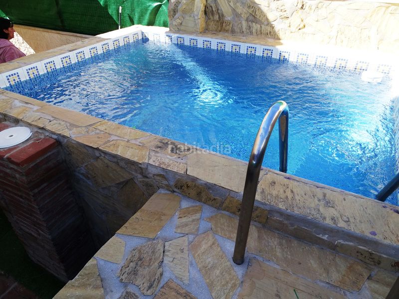 Foto 87baca94-9226-4d33-8ca3-38789dfb0f9c. Casa adossada amb calefacció aparcament piscina a Rincón de la Victoria