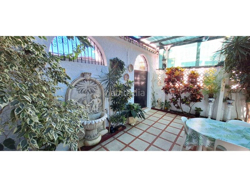 Foto f9e38aeb-9a6b-494a-9652-75f6aa279c3c. Casa aparellada amb aparcament a Torre de Benagalbón Rincón de la Victoria