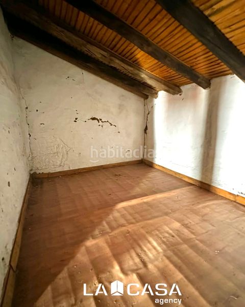 Foto ffe4ebc0-0a9c-4998-bedf-80c134b050c1. Casa aparellada a Ronquillo (El)