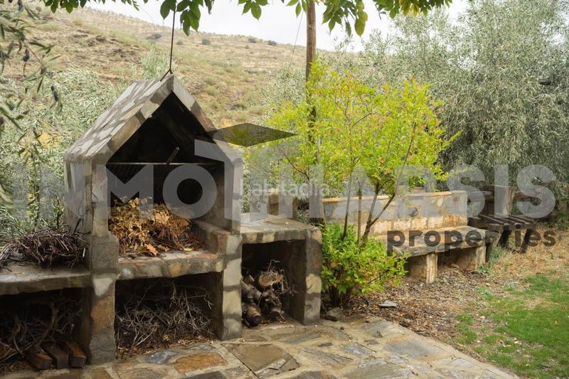 Foto 135d9b5d-ef5a-49c1-a140-86546bea7cf3. Casa amb aparcament a Abrucena