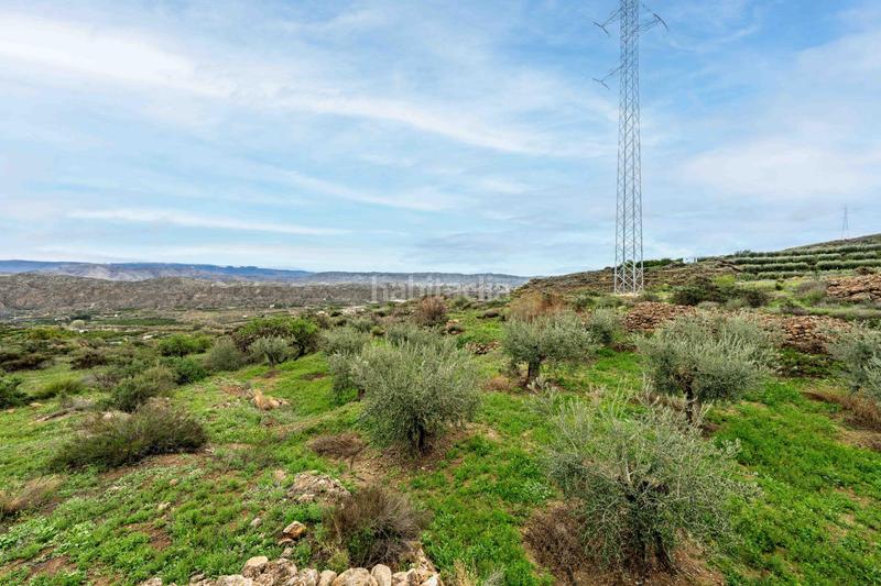 Foto 52ebb1c4-cf19-4a2c-9761-1d083ba2ef37. Finca rústica terreno con vistas en illar en Íllar