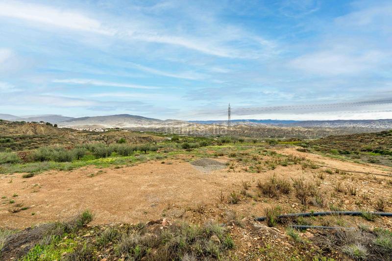 Foto a1c83b6f-e083-4401-9f49-3cf0b5307dfb. Finca rústica terreno con vistas en illar en Íllar