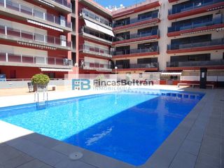 Apartment  Calle vi de carlon. Apartamento de dos dormitorios con piscina comunitaria