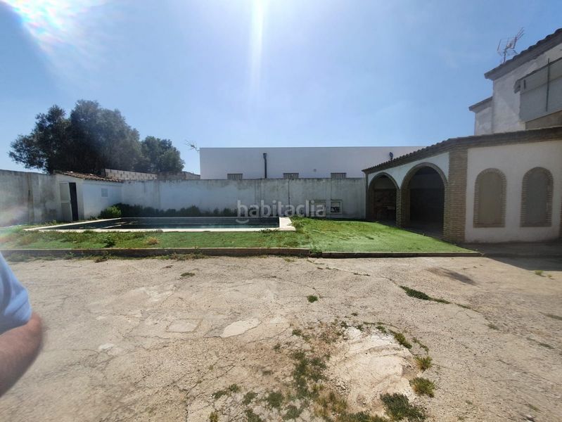 Foto f41ed92f-086d-409e-a65b-0fc52826ba77. Masia amb piscina a La Banda - Campo de Fútbol Chiclana de la Frontera