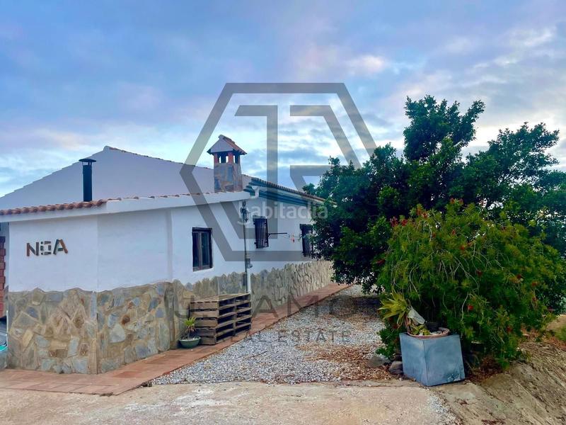 Foto 634020d0-92e1-4767-968c-d5cc002a43fc. Masía casa con piscina y terreno cultivado en triana en Vélez - Málaga