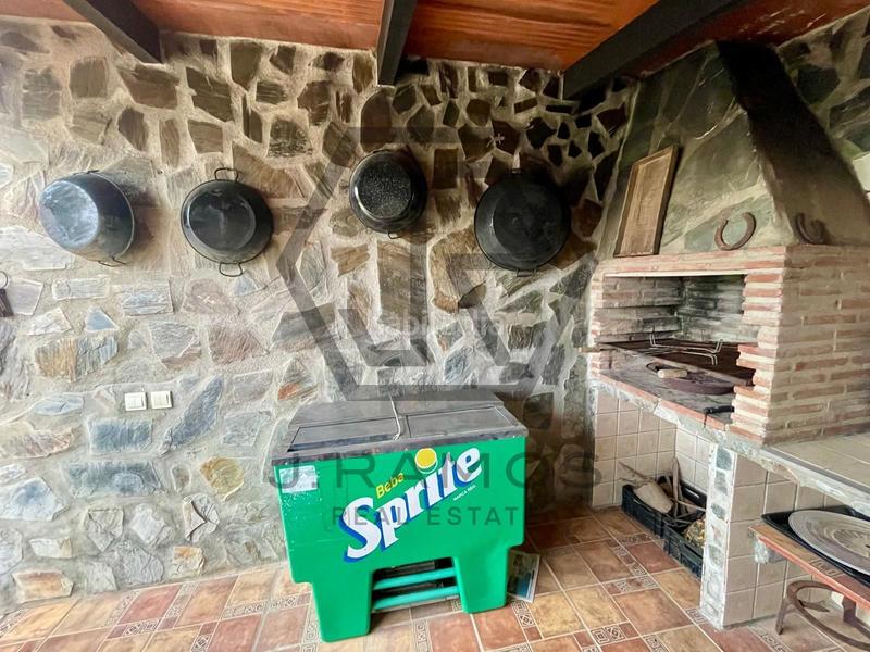 Foto f05d2f88-1fae-45e3-8fb0-24f14541fa7f. Masía casa con piscina y terreno cultivado en triana en Vélez - Málaga