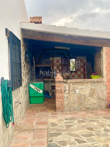 Foto f6e8c160-fa83-4b59-a5b4-f86801d97de5. Masía casa con piscina y terreno cultivado en triana en Vélez - Málaga