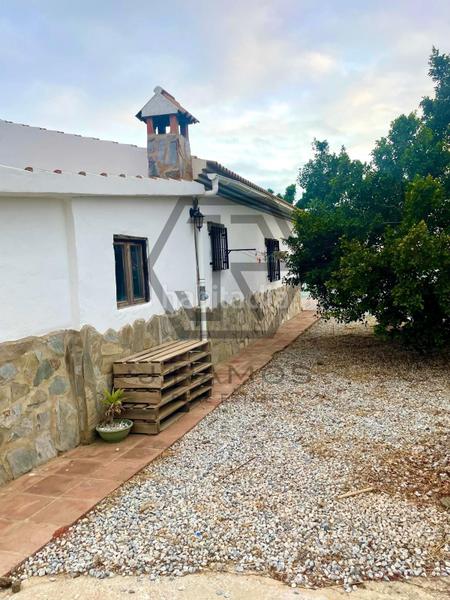 Foto fad60a1e-cc90-4c1e-974a-a6088634aa37. Masía casa con piscina y terreno cultivado en triana en Vélez - Málaga