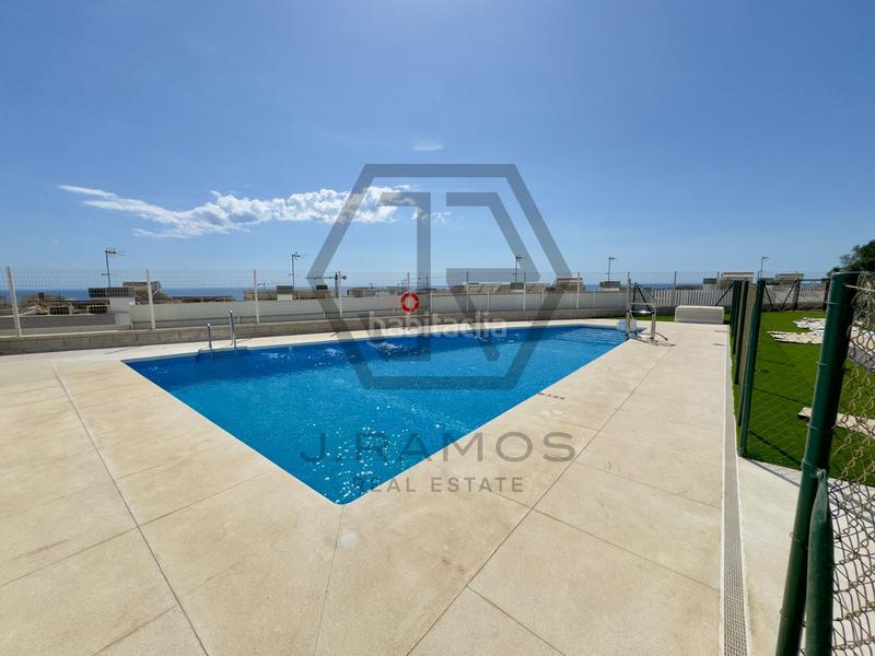Foto 1128fa06-971c-4385-9bb3-ac03664efa6c. Casa adossada amb calefacció piscina a Viña Málaga Torre del Mar