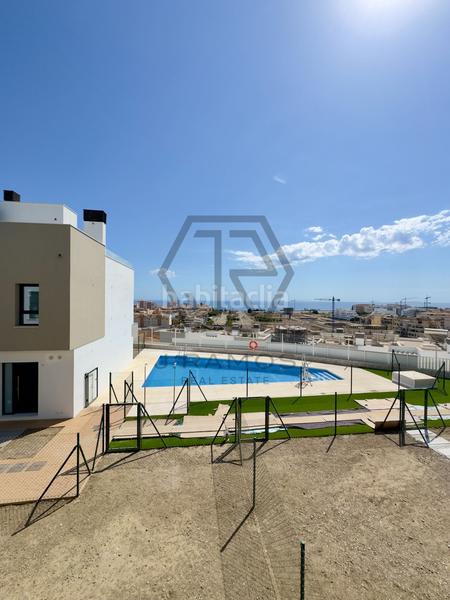 Foto ee2ce2cf-4fd3-40f6-ba2d-8e26e182a37f. Casa adossada amb calefacció piscina a Viña Málaga Torre del Mar