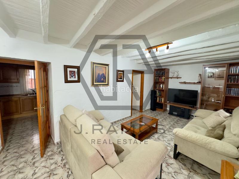 Foto bed40d62-24ac-4ec4-bab3-c5fc40f834a3. Casa adossada a Viñuela