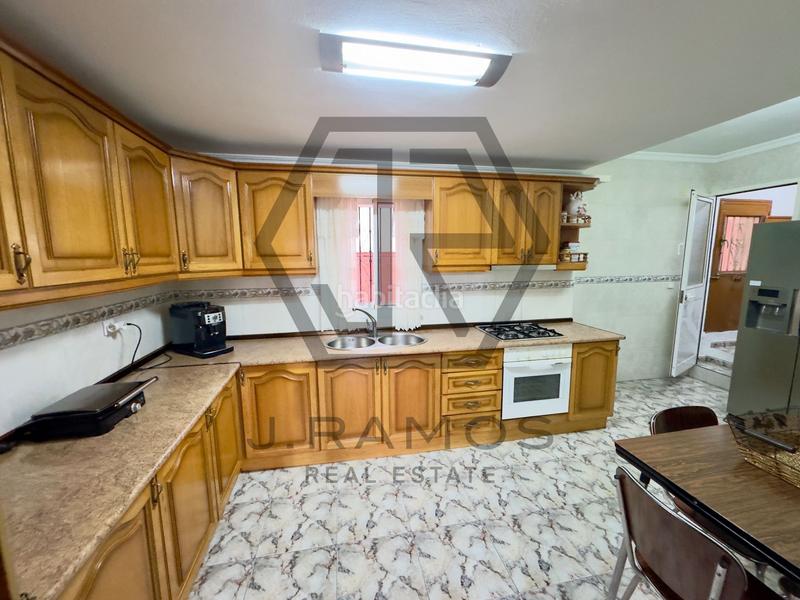 Foto c48db2cf-1e44-45f1-a328-9e5e7aed6c44. Casa adossada a Viñuela