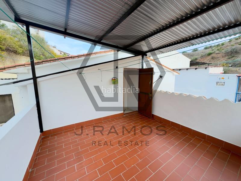 Foto d70484d4-a7eb-4fe1-9c2d-0af7fa75e603. Casa adossada a Viñuela