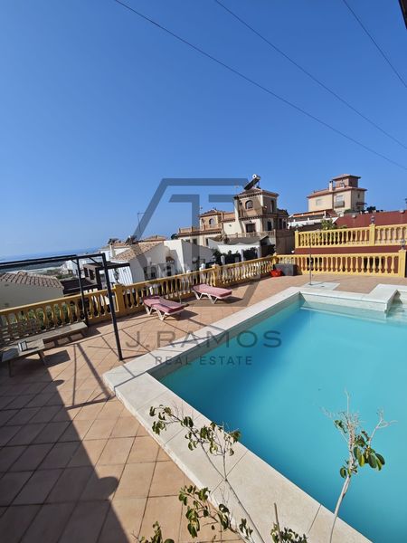 Foto ebcd90e1-f0a4-4cfa-95dd-691a98933452. Casa a Urbanización Santa Rosa Torrox