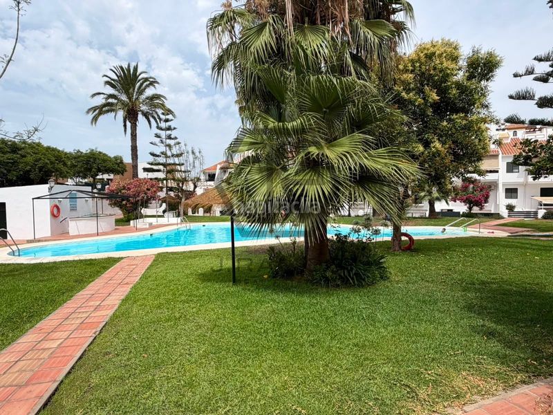 Foto 82341e1d-bc2f-4315-8afd-ab296272264e. Casa adossada amb calefacció piscina a Viña Málaga Torre del Mar