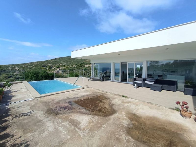 Foto 5839df06-dd77-4cda-b74b-8ed73e6b1650. Casa amb calefacció aparcament piscina a Chullera Manilva