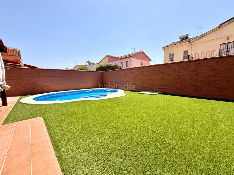Foto ae2b40c9-92cc-45b6-8e16-c1cfceed9936. Casa aparellada amb xemeneia aparcament piscina a Espartinas