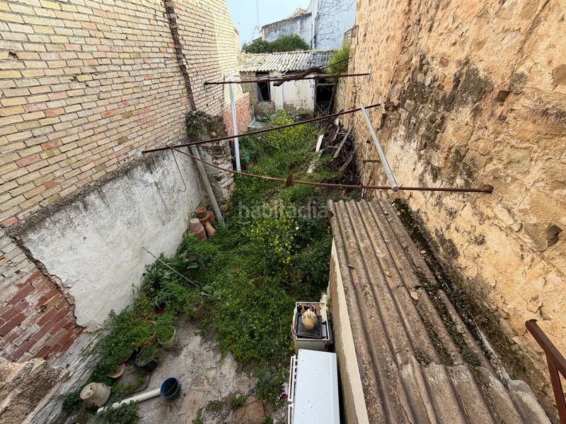 Foto d0e0ab9e-f019-41be-8e42-cf705a734dff. Casa amb xemeneia aparcament a Úbeda
