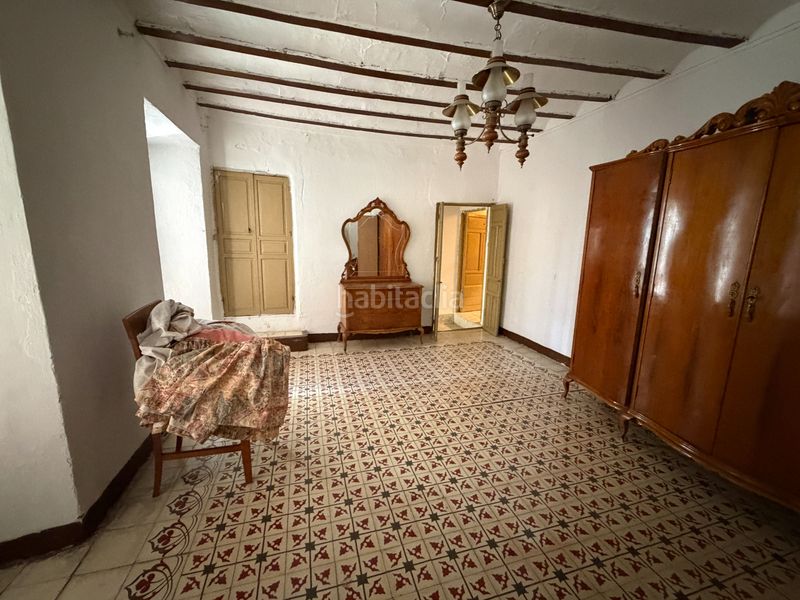 Foto ef2da29f-d35a-4da2-ad1c-d9d3dc4fc631. Casa amb xemeneia aparcament a Úbeda