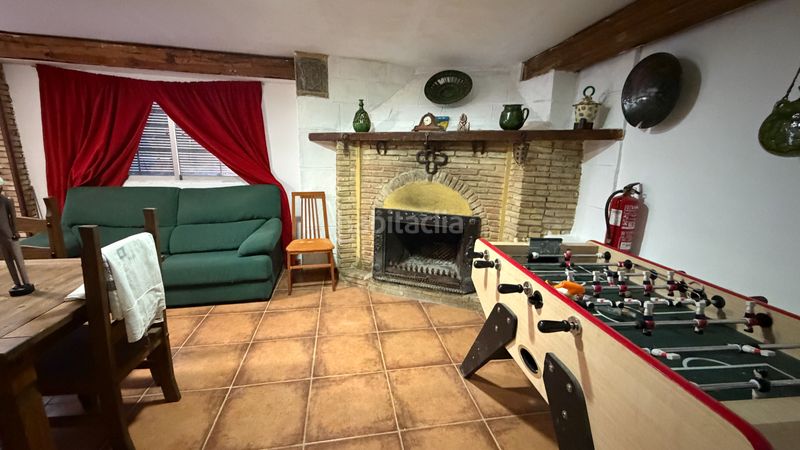 Foto afdede2d-0fda-44d1-8fda-f4560c10dc3d. Casa amb xemeneia a Úbeda