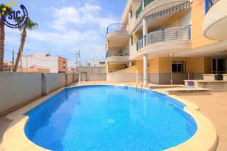 Piano terra  Calle del pilar 30. Planta baja en urbanización con piscina en xilxes playa