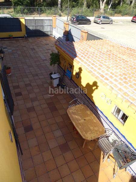 Foto f5eeeb4a-ed5f-426b-abdd-514251b0ea73. Casa adossada amb xemeneia aparcament a Soto de Vistahermosa Puerto de Santa María (El)