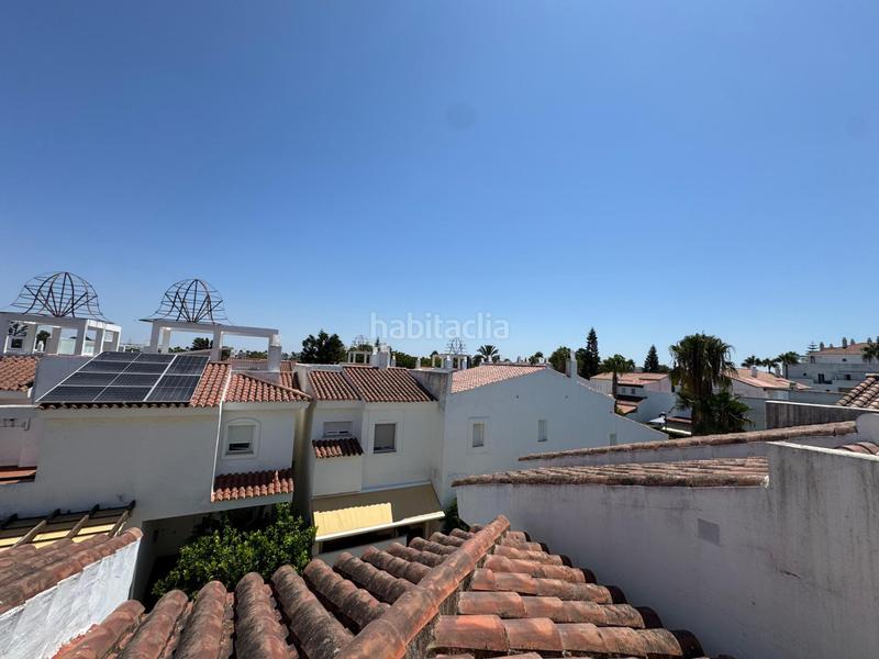 Foto 8109ee00-f684-4d81-a625-93ac91fc315b. Reihenhaus mit parking pool in Costa Ballena Golf Rota