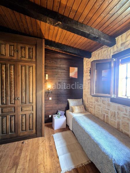 Foto 6eebacdd-b8c4-46c3-8388-e9ab4ea24ef6. Chalet una casa con encanto rústico y lista para entrar a vivir en Algeciras